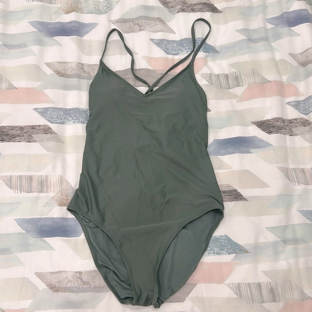 One piece v-halter-neck bathing suit with back tie